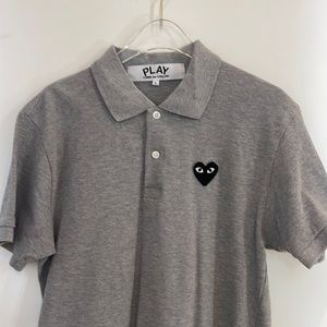SOLD COMME DES GARCONS Gray Classic Polo heart patch at the chest.